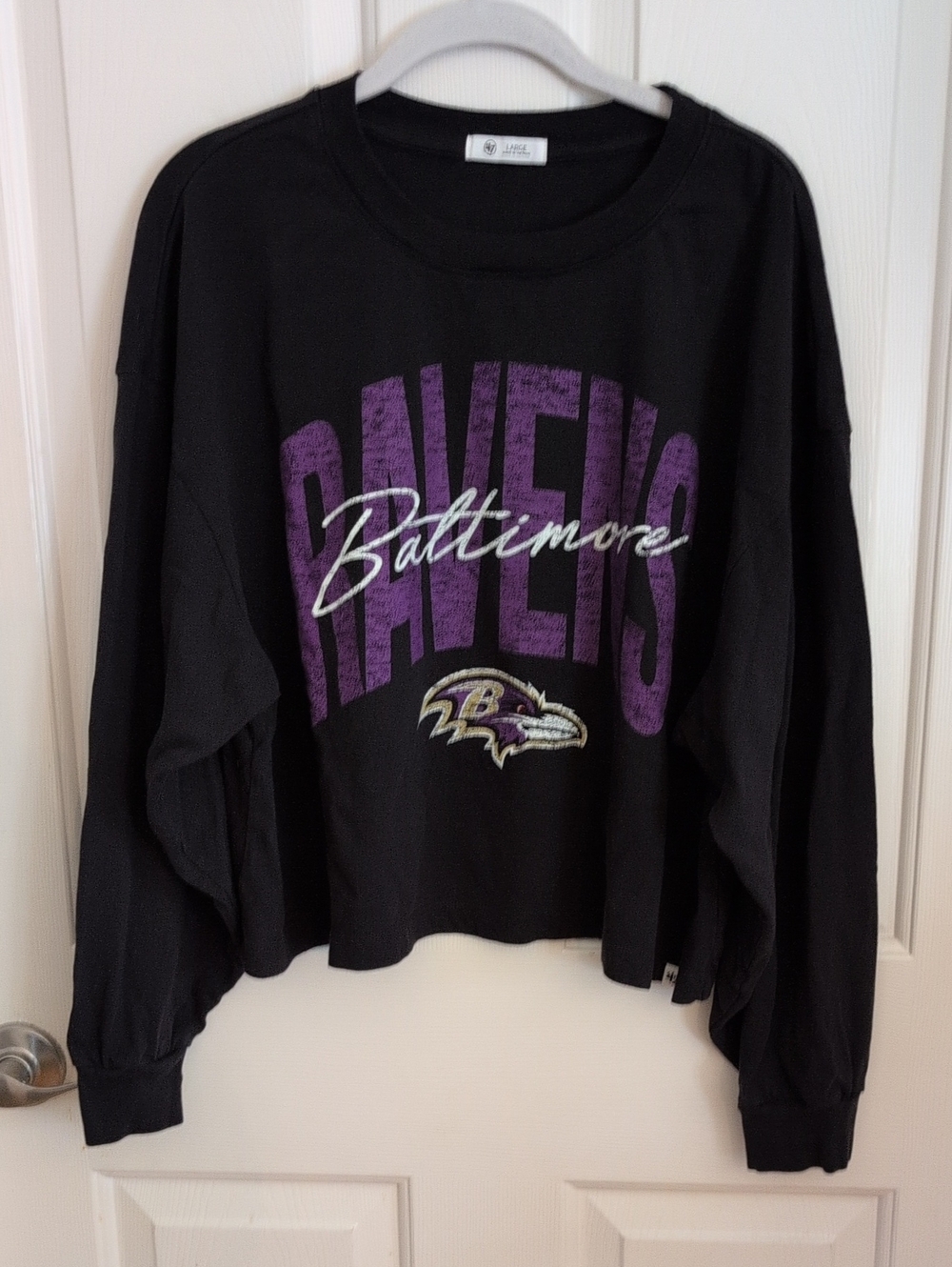 Baltimore Ravens Women's Black Crewneck Sweatshirt with Purple Logo